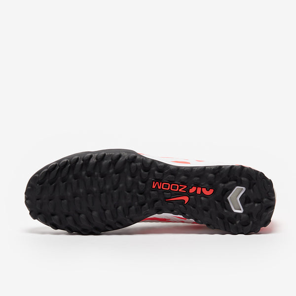 Black and red football shoes sole with brand logo on a white background