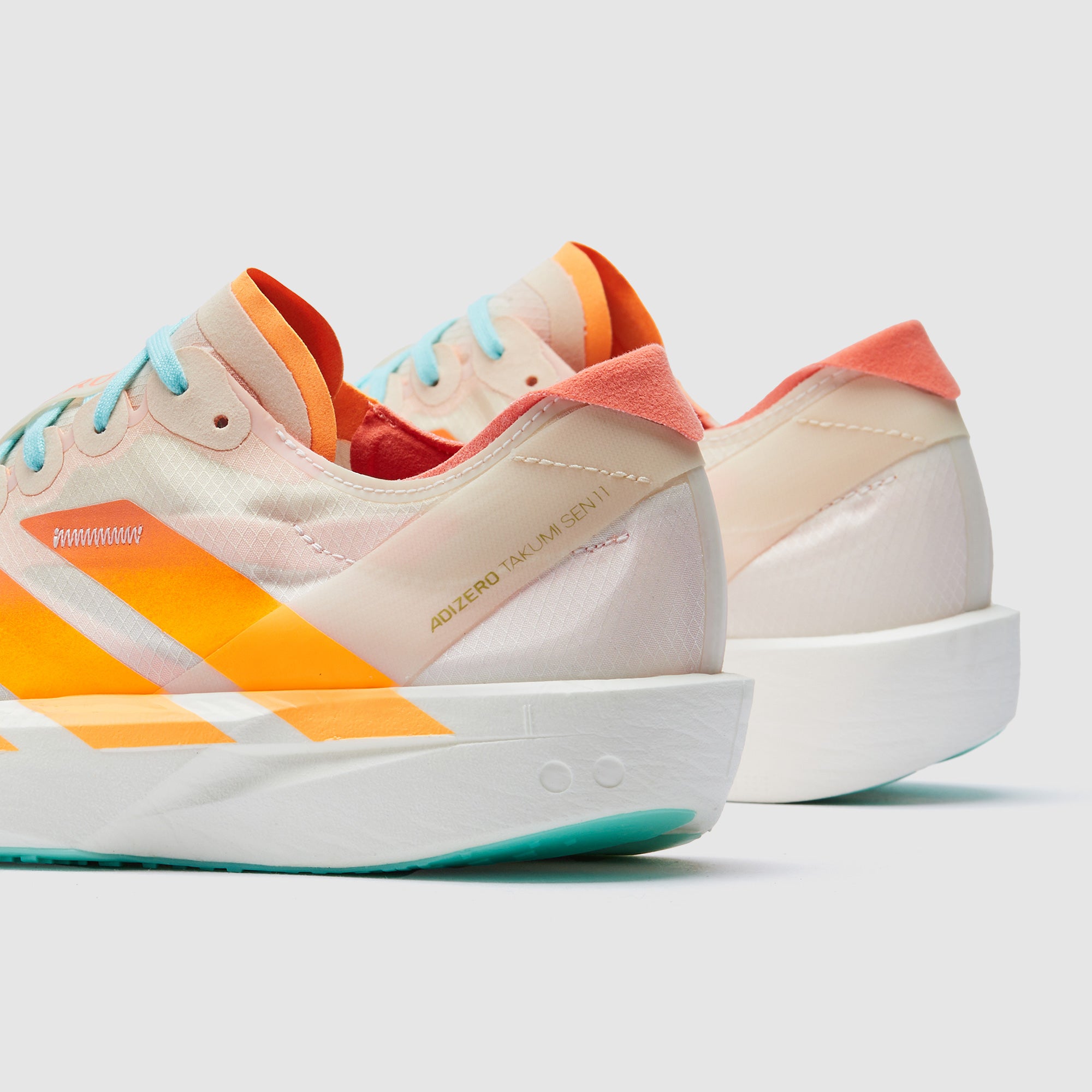 「111」 adidas Womens adizero Takumi Sen 11 - Crystal Sand/Flash Orange