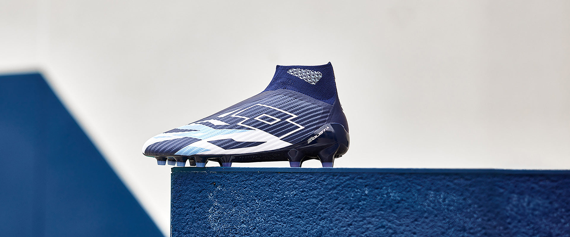 Lotto Solista 100 VI Gravity FG - Navy Blue/All White/Cornflower -