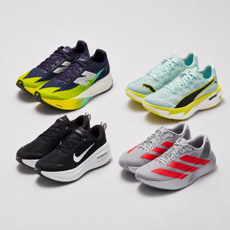 Mens running shoes on a plain background